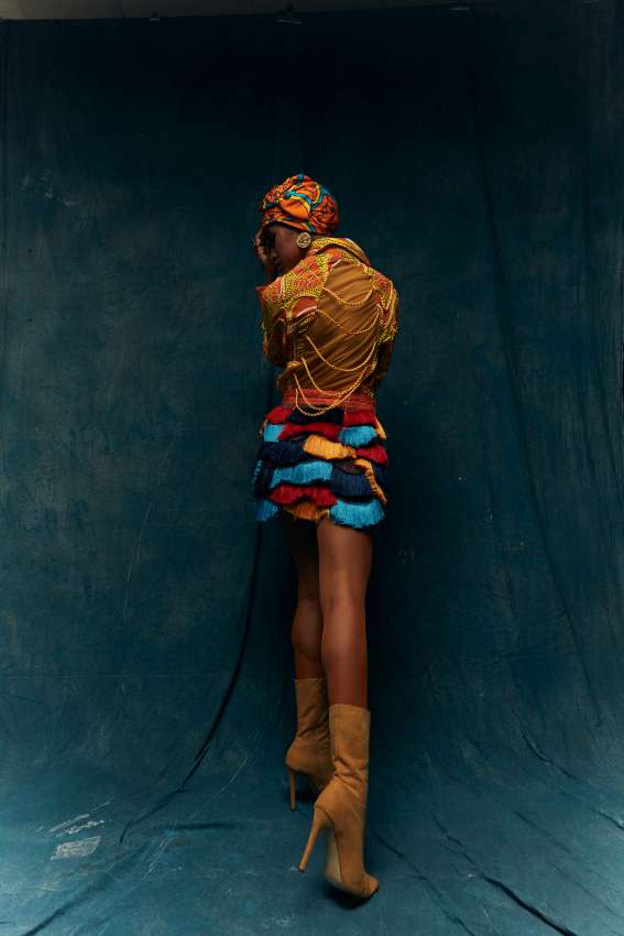 Orange print shirt with braids image 1